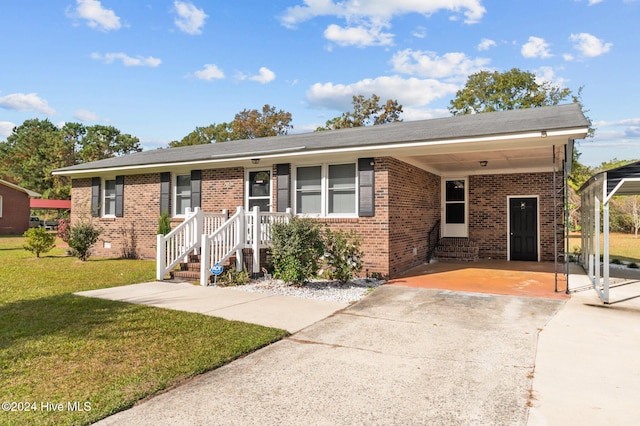 single story home featuring a carport and a front yard