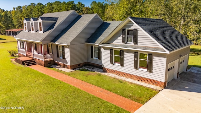 cape cod house featuring a front lawn, a porch, and a garage