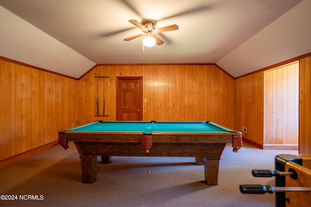 rec room featuring lofted ceiling, wood walls, carpet, and ceiling fan