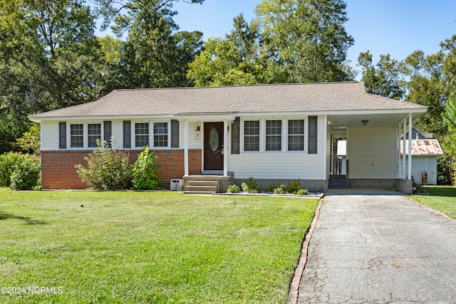 ranch-style home with a front lawn