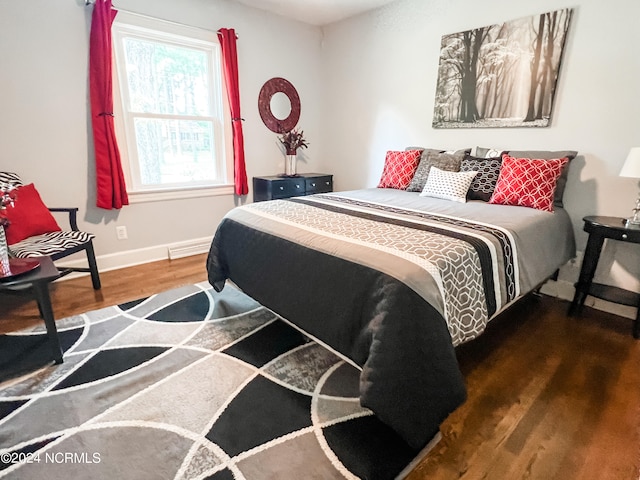 bedroom featuring dark wood-type flooring