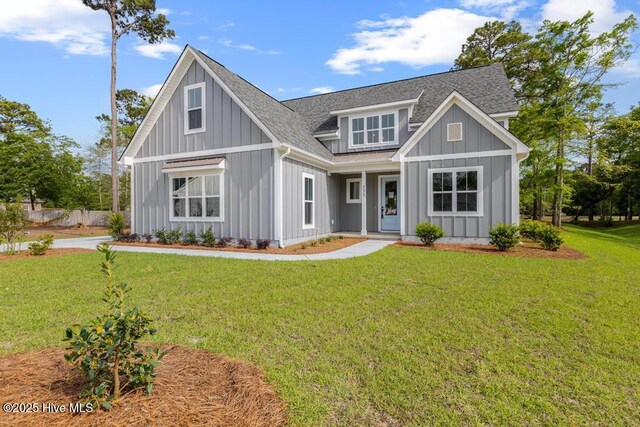233 Hampton Ct, Hampstead, NC 28443 - staircase with ceiling fan, a decorative wall, and wood finished floors