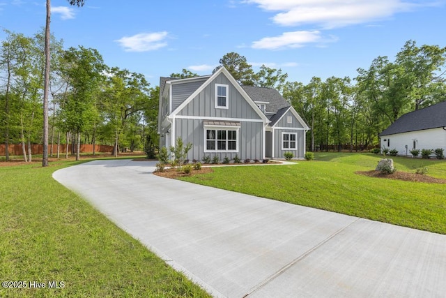 233 Hampton Ct, Hampstead, NC 28443 - unfurnished living room with a ceiling fan, wood finished floors, a fireplace, and crown molding