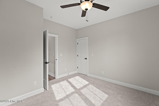 233 Hampton Ct, Hampstead, NC 28443 - unfurnished sunroom with a residential view and ceiling fan