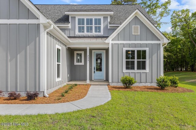 233 Hampton Ct, Hampstead, NC 28443 - unfurnished living room featuring a fireplace, wood finished floors, stairs, and ceiling fan