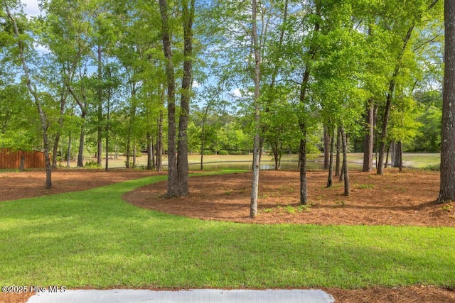 233 Hampton Ct, Hampstead, NC 28443 - craftsman inspired home with a standing seam roof, roof with shingles, board and batten siding, and metal roof