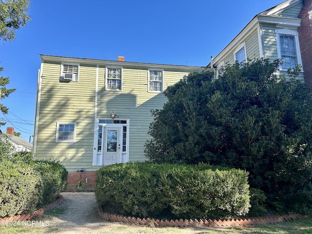 view of front of house with cooling unit