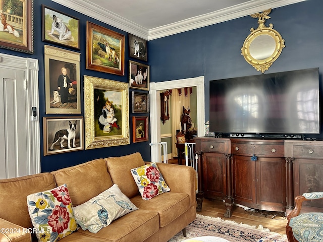 living area with crown molding and wood finished floors