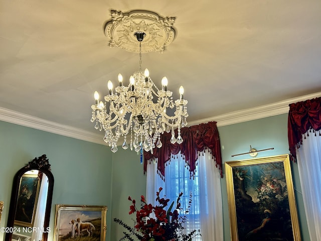 room details with a notable chandelier and crown molding