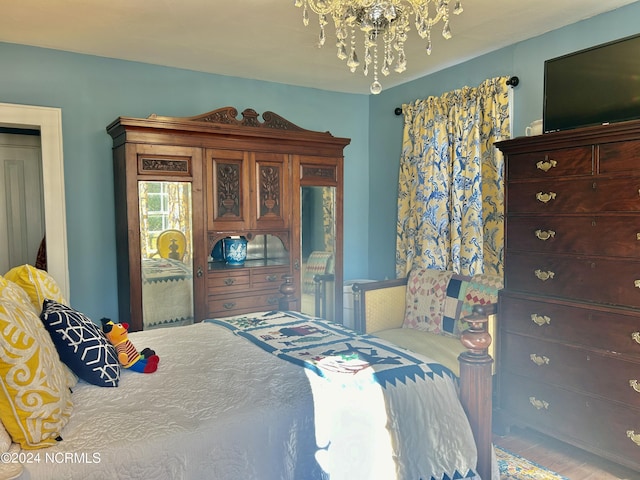 bedroom with a chandelier