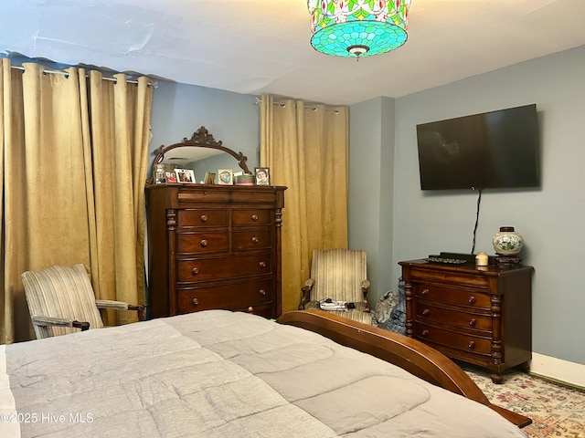 bedroom with baseboards