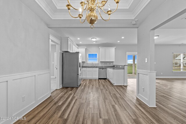 unfurnished living room featuring light wood-type flooring and ceiling fan