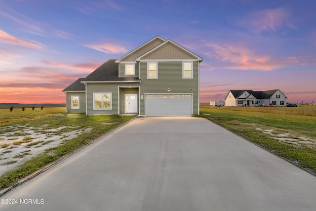 view of front of home with a garage