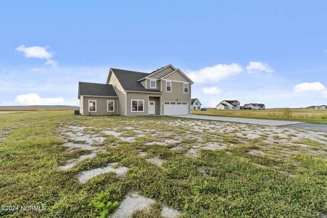 view of property exterior with a rural view and central AC unit