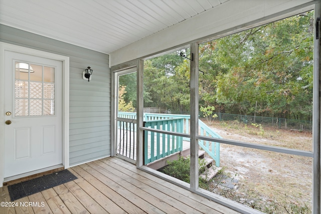 unfurnished sunroom with a healthy amount of sunlight