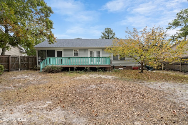 view of front of home with a wooden deck