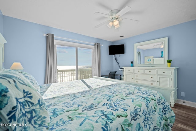 bedroom with dark hardwood / wood-style floors, access to exterior, and ceiling fan