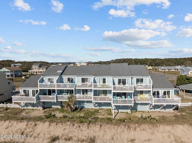 503 Pelican Ct Unit 503, Kure Beach, NC 28449 - back of house with a residential view and a shingled roof