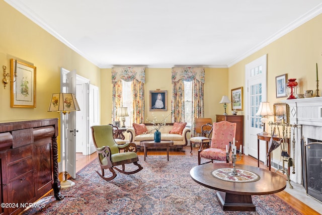 living room with crown molding and wood-type flooring