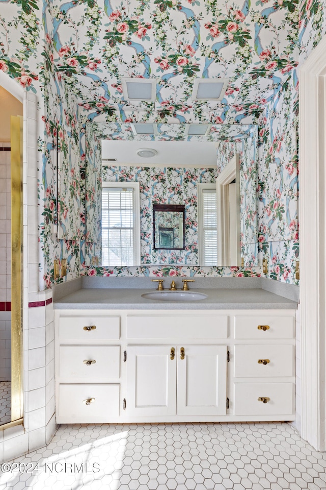 bathroom featuring vanity and tile patterned flooring