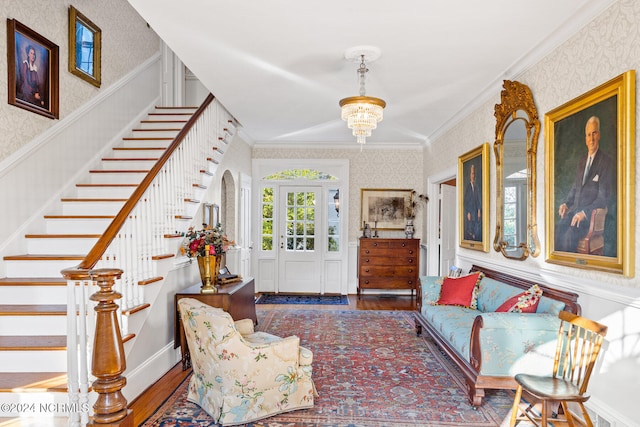 interior space featuring crown molding, dark hardwood / wood-style floors, and a notable chandelier