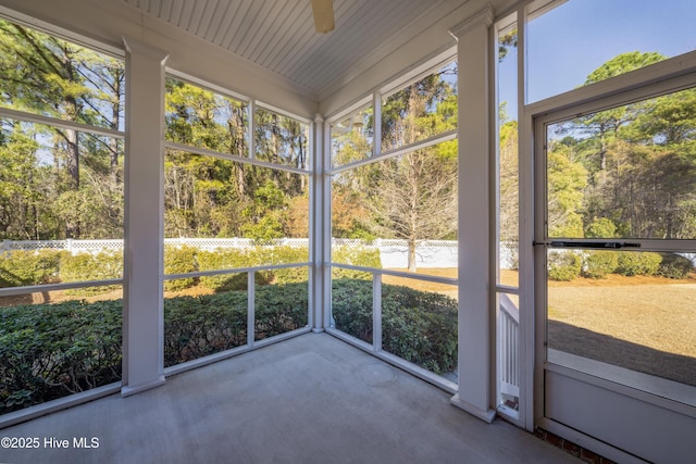 unfurnished sunroom featuring a wealth of natural light