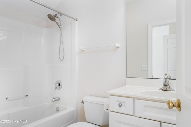 full bathroom with vanity, tub / shower combination, and toilet