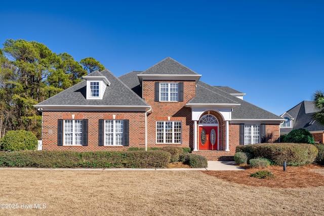 view of property featuring a front yard