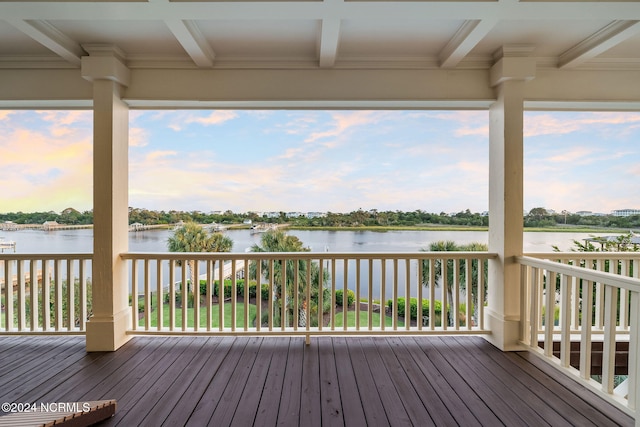 deck featuring a water view