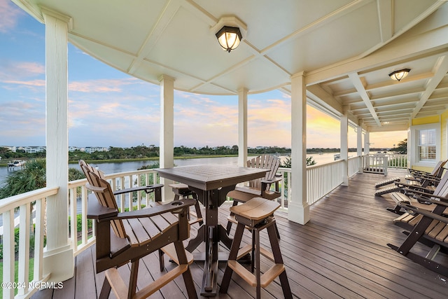 deck at dusk with a water view