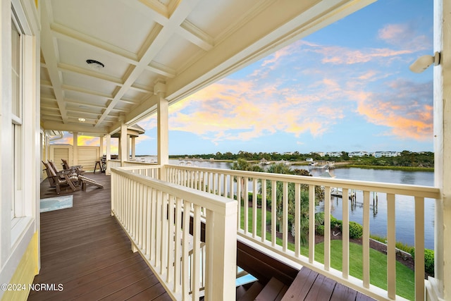 balcony at dusk with a water view