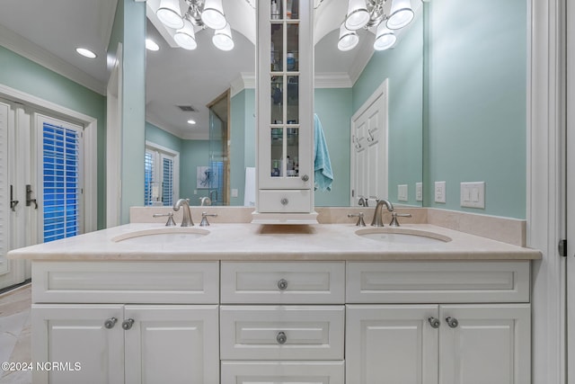 bathroom with vanity and ornamental molding