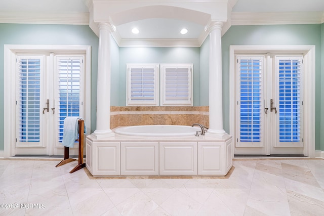 bathroom featuring french doors, a tub to relax in, and crown molding