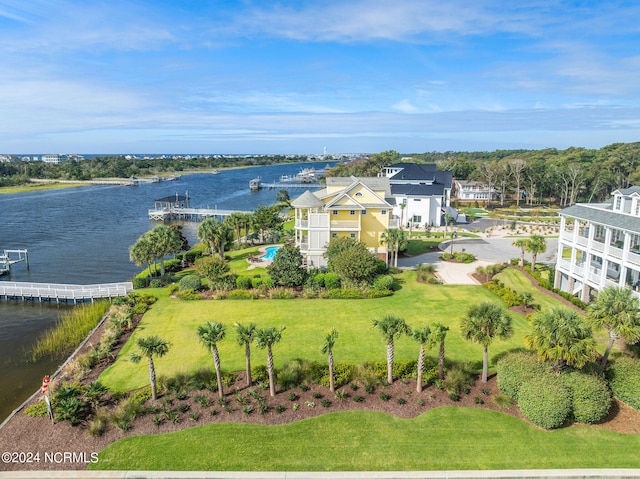 birds eye view of property featuring a water view