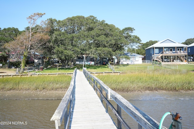 dock area featuring a water view
