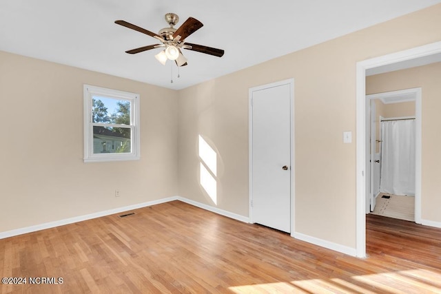 unfurnished bedroom with light hardwood / wood-style flooring and ceiling fan