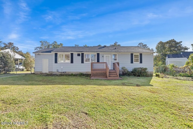 ranch-style house with a front lawn