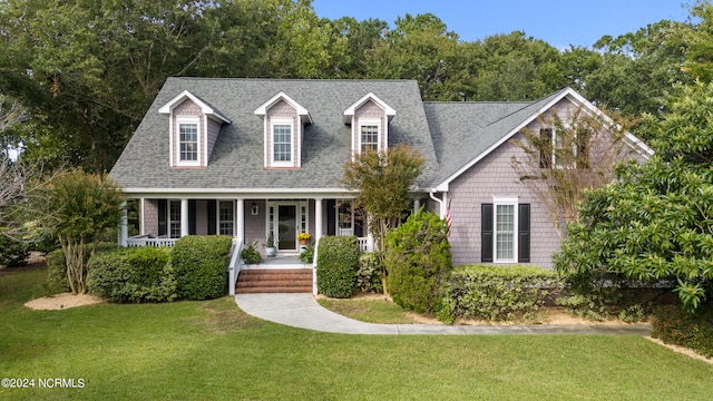 cape cod home with a porch and a front yard