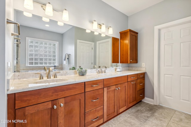 bathroom featuring vanity and tile patterned floors