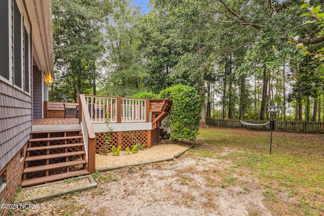 view of yard with a wooden deck