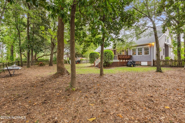 view of yard featuring a deck