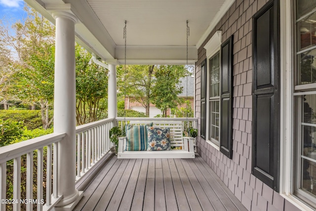 deck featuring covered porch