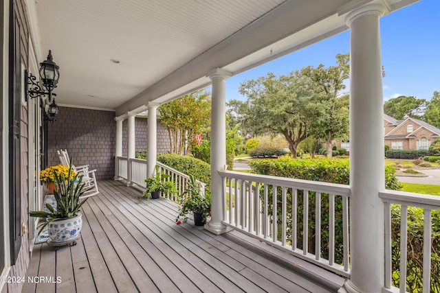 wooden deck featuring a porch