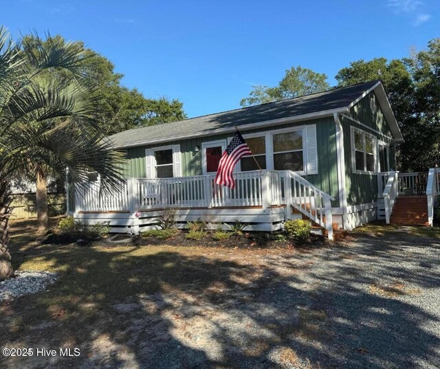 view of front of house featuring a deck