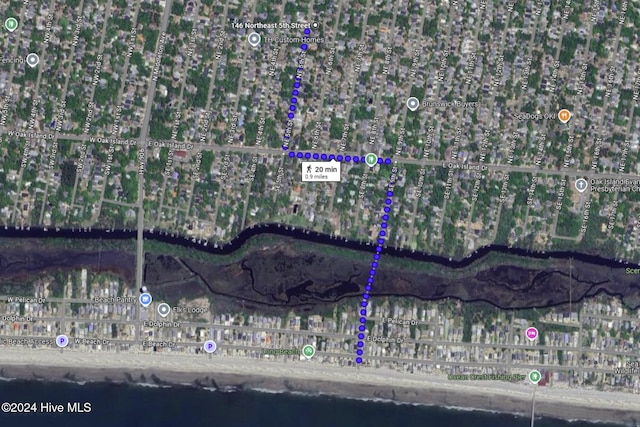 146 NE 5th St, Oak Island, NC 28465 - manufactured / mobile home featuring crawl space, a deck, and roof with shingles