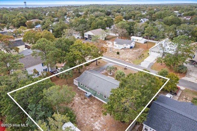 146 NE 5th St, Oak Island, NC 28465 - rear view of house featuring central AC unit, a wooden deck, a shingled roof, and fence