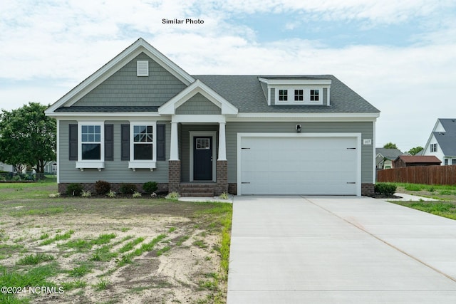 craftsman-style house with a garage