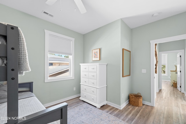 bedroom featuring ceiling fan and light wood-type flooring