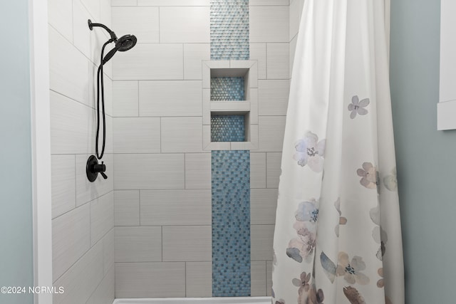 bathroom featuring walk in shower