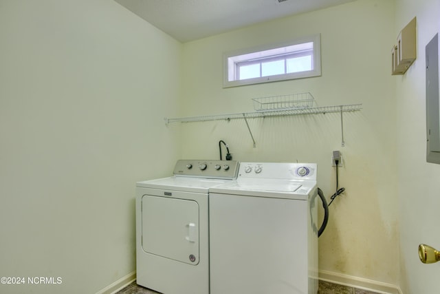 washroom with washer and dryer